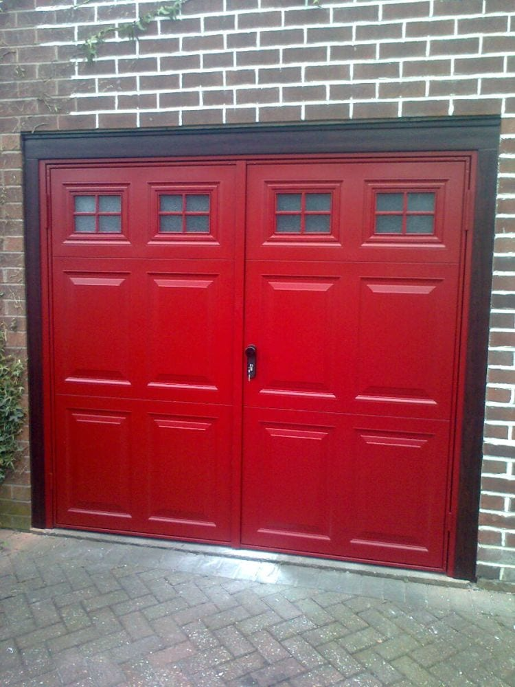 Red Side Hinge Garage doors with a black handle